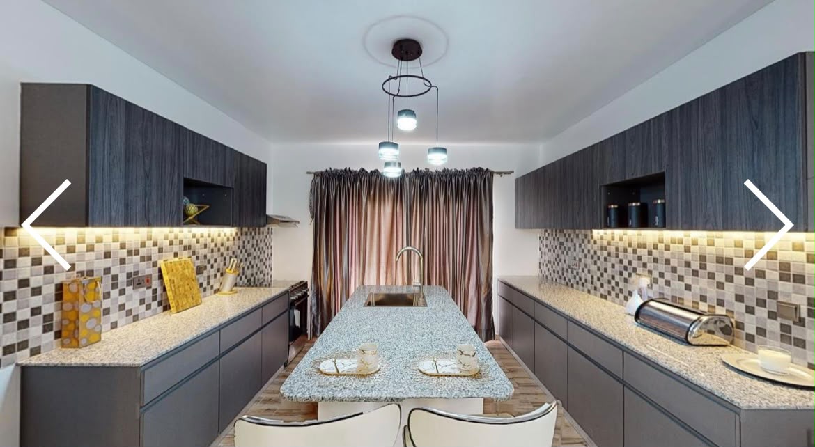 Rendering of a fitted kitchen with granite island